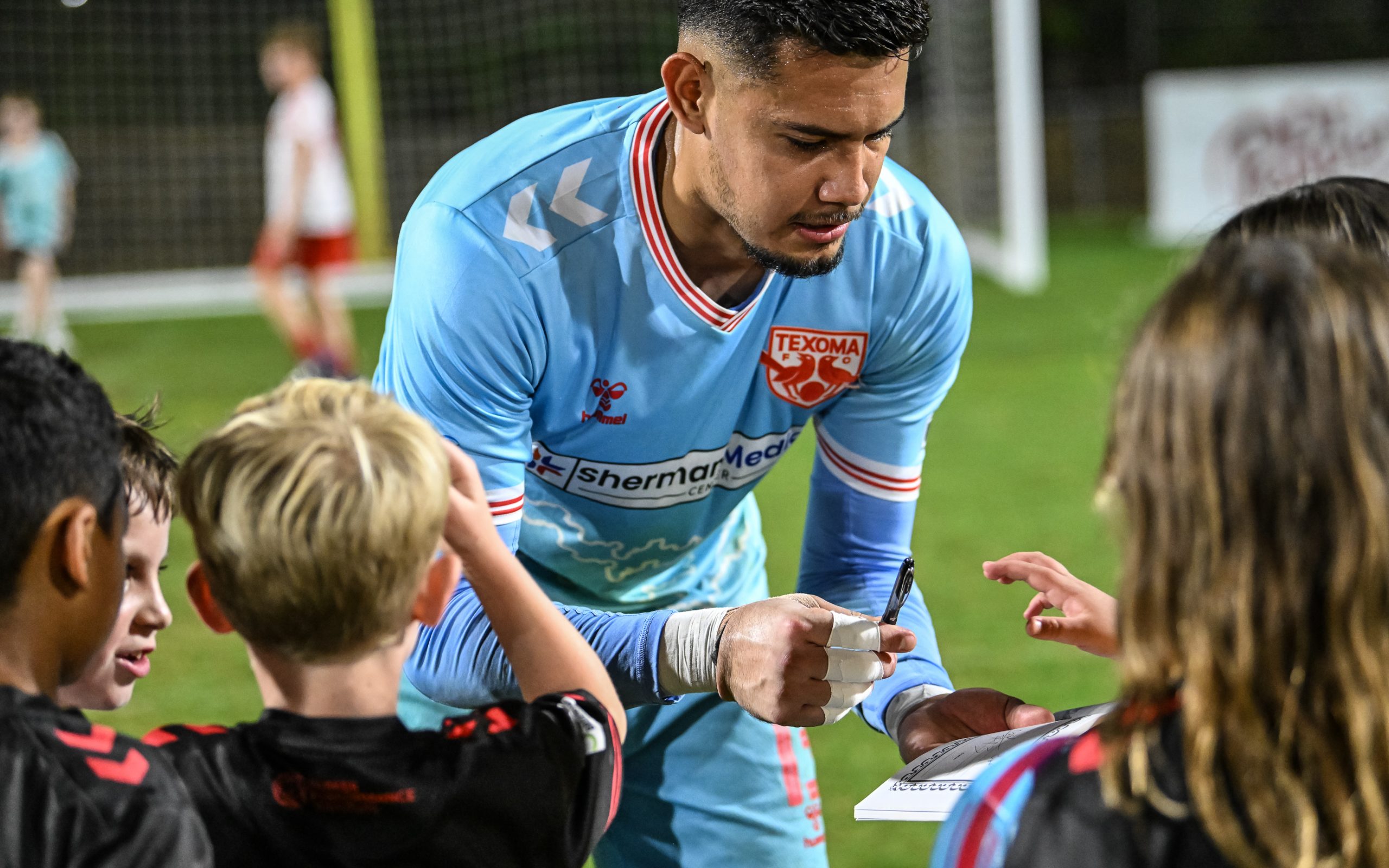 Texoma FC's Javier Garcia signs autographs after the win over the Richmond Kickers, October 11, 2025. (Mike Brooks, 3rd Degree)