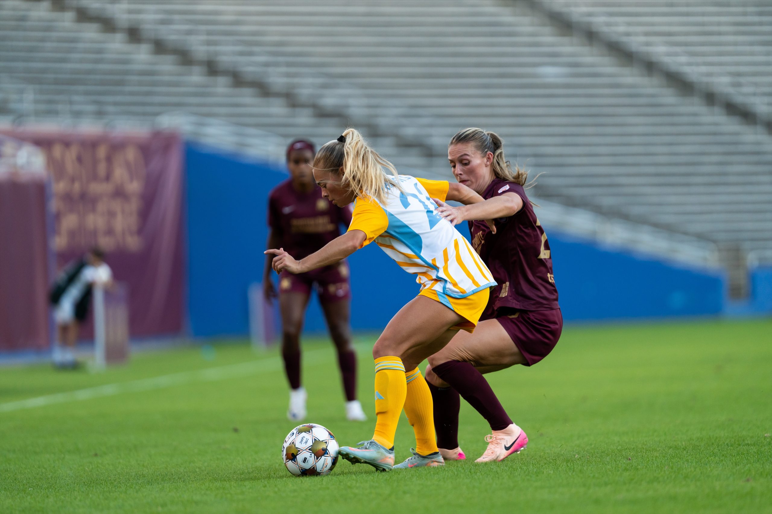 Allie Thornton battles for the ball with Grace Phillpotts (Courtesy Dallas Trinity FC)