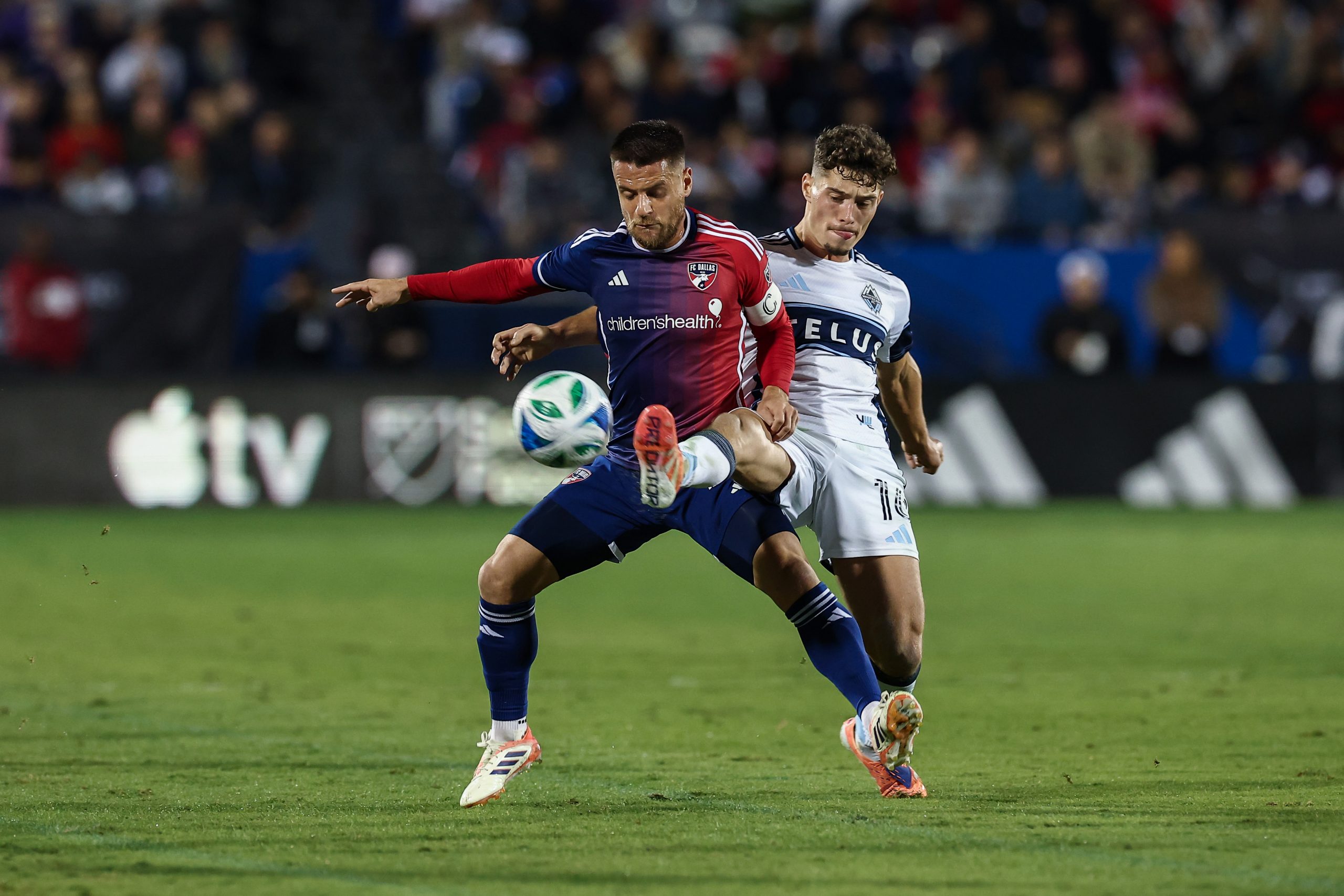 FCD captain Ramiro shields off Sebastian Berhalter of the Vancouver Whitecaps in the MLS Cup Playoff game 2, November 1, 2025. (Matt Visinsky, 3rd Degree)