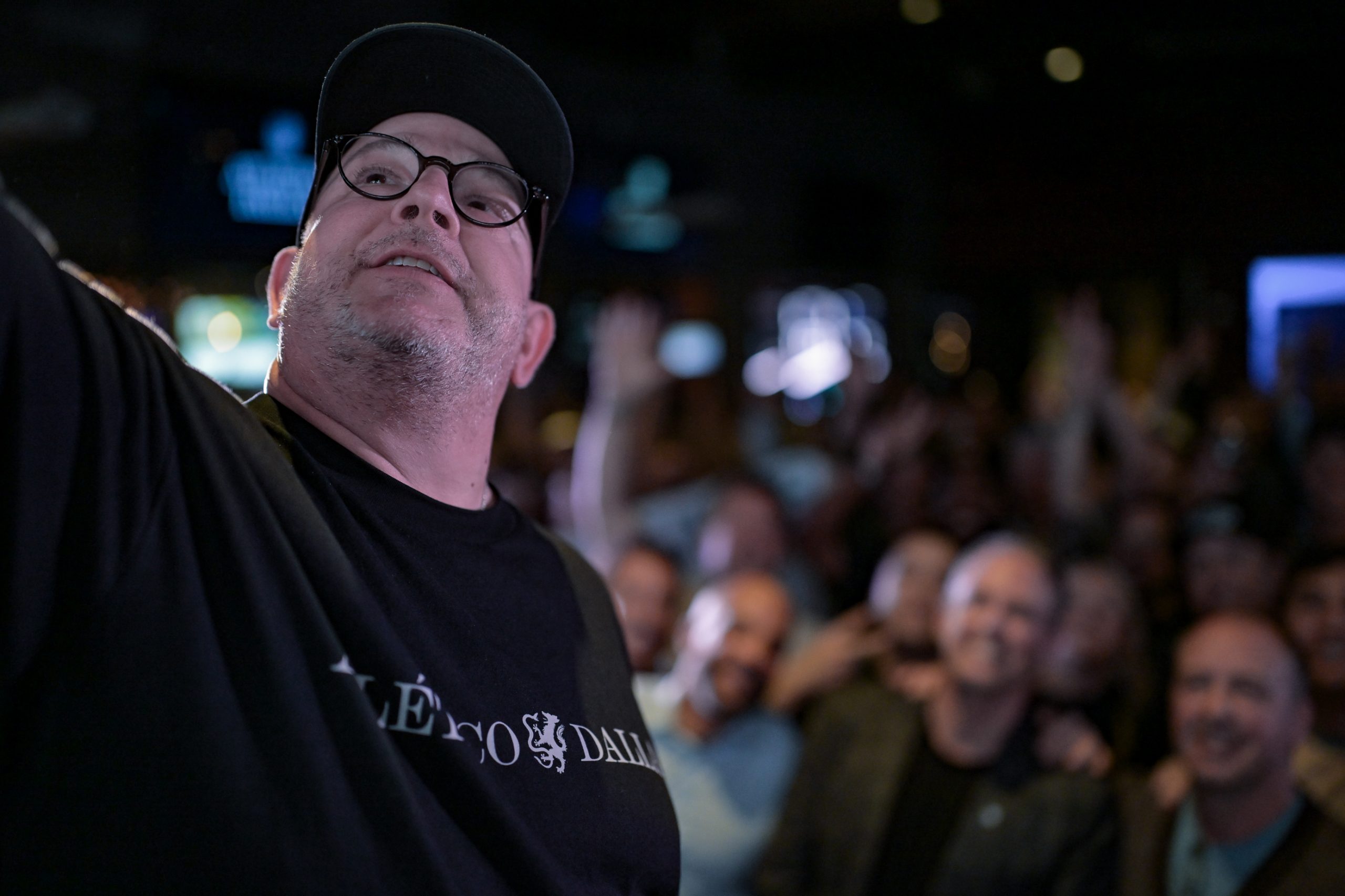 Sam Morton, Atlético Dallas Co-Founder, (left, hat) takes a group selfie from the crowd at the Atlético Dallas introduction event of new head coach Peter Luccin, February 12, 2026. (Mike Brooks, 3rd Degree)