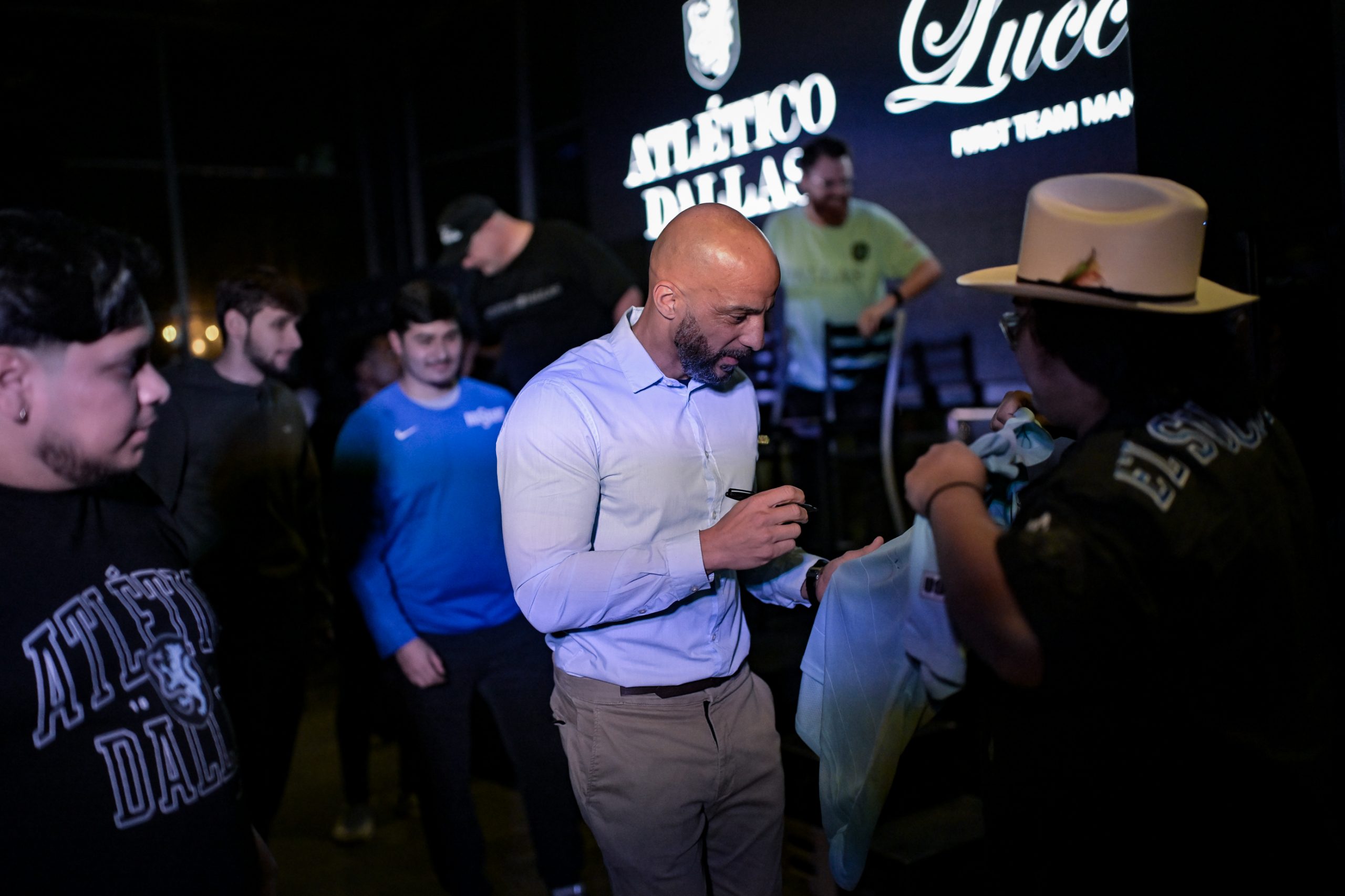 Peter Luccin signs autographs at the Atlético Dallas introduction event of new head coach Peter Luccin, February 12, 2026. (Mike Brooks, 3rd Degree)