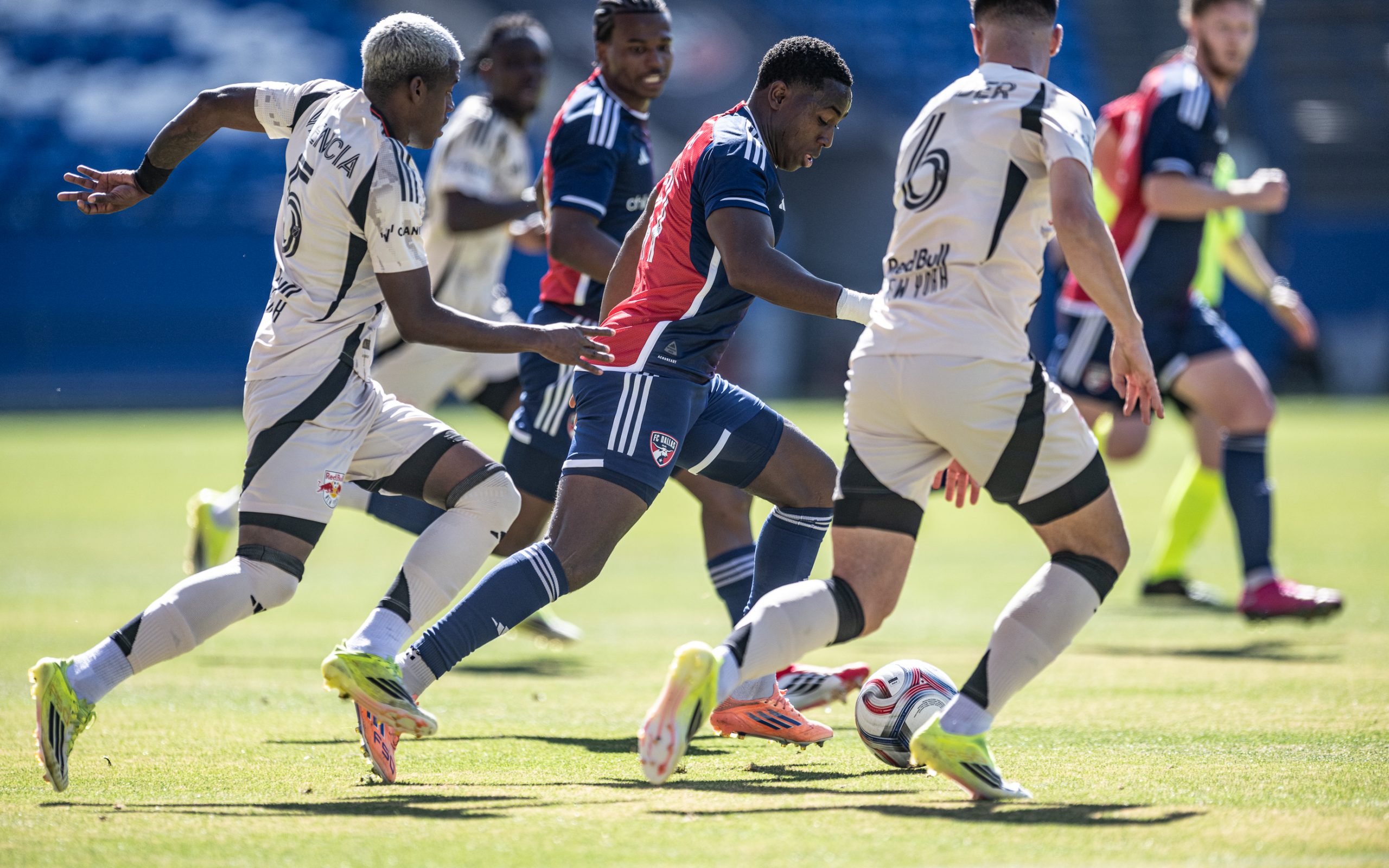 Anderson Julio dribbles through the defense in an FC Dallas preseason game against New York Red Bulls, February 7, 2026. (Mike Brooks, 3rd Degree)