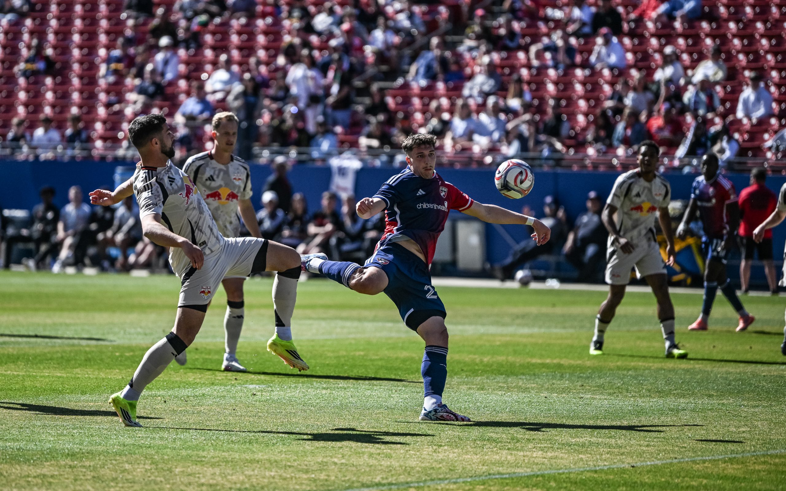 Logan Farrington lines up a side volley in an FC Dallas preseason game against New York Red Bulls, February 7, 2026. (Mike Brooks, 3rd Degree)