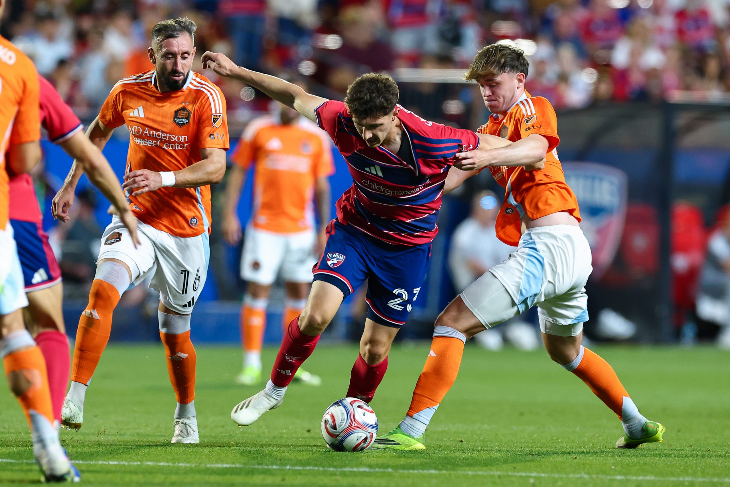 Logan Farrington bulls his way through the defense against Houston Dynamo, March 21, 2026. (Matt Visinsky, 3rd Degree)