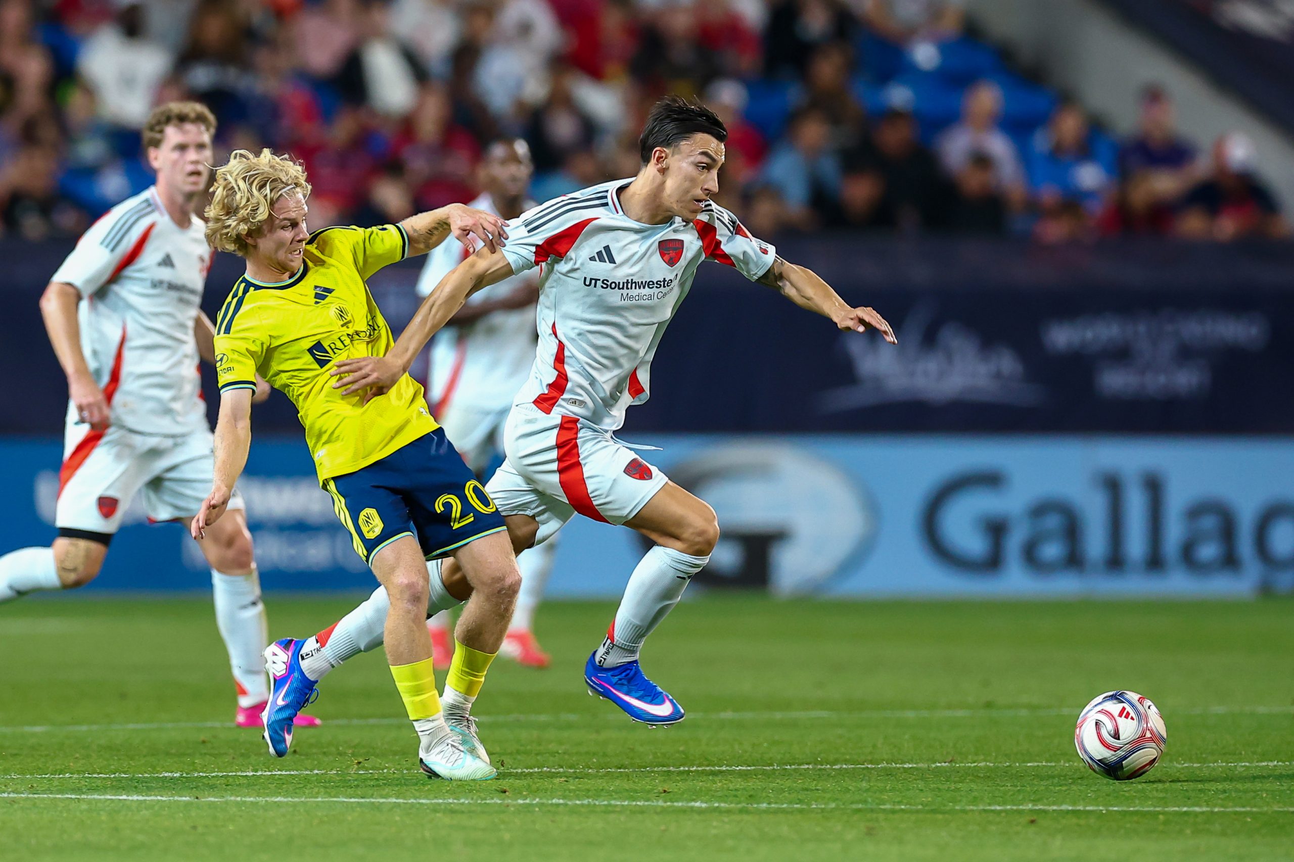 Petar Musa powers past a defender against Nashville SC, February 28. 2026. (Matt Visinsky, 3rd Degree)