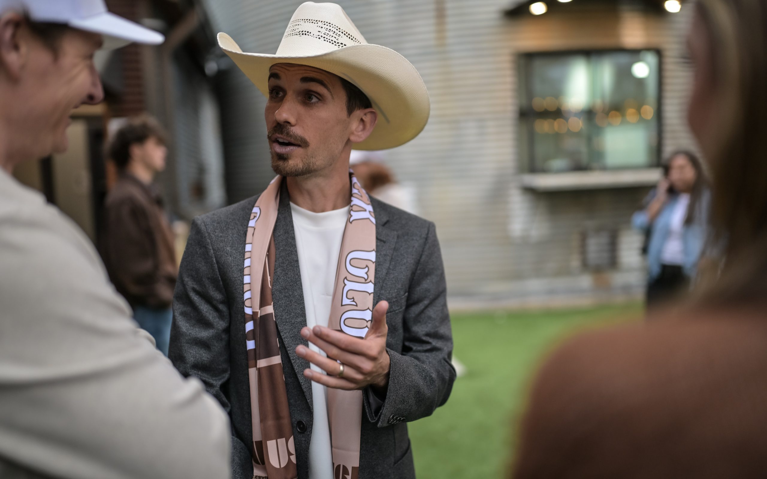 Rodeo SC President and Founder Ben Watson talks to fans at the Rodeo SC Logo Reveal Party