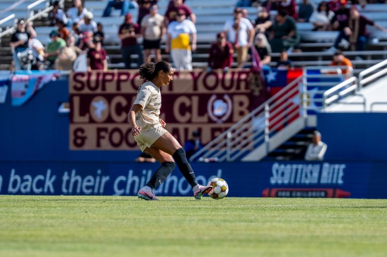 Maya McCutcheon touches the ball in front of the home supporters - Carolina Ascent at Dallas Trinity, Apr. 19, 2026 (Anna Dolmany, Dallas Trinity FC)