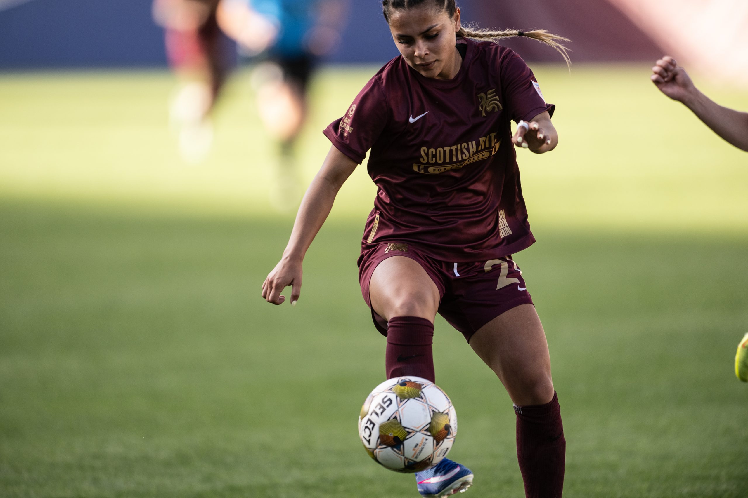 Camryn Lancaster takes a touch against Spokane Zephyr, April 4, 2025. (Mike Brooks, 3rd Degree)