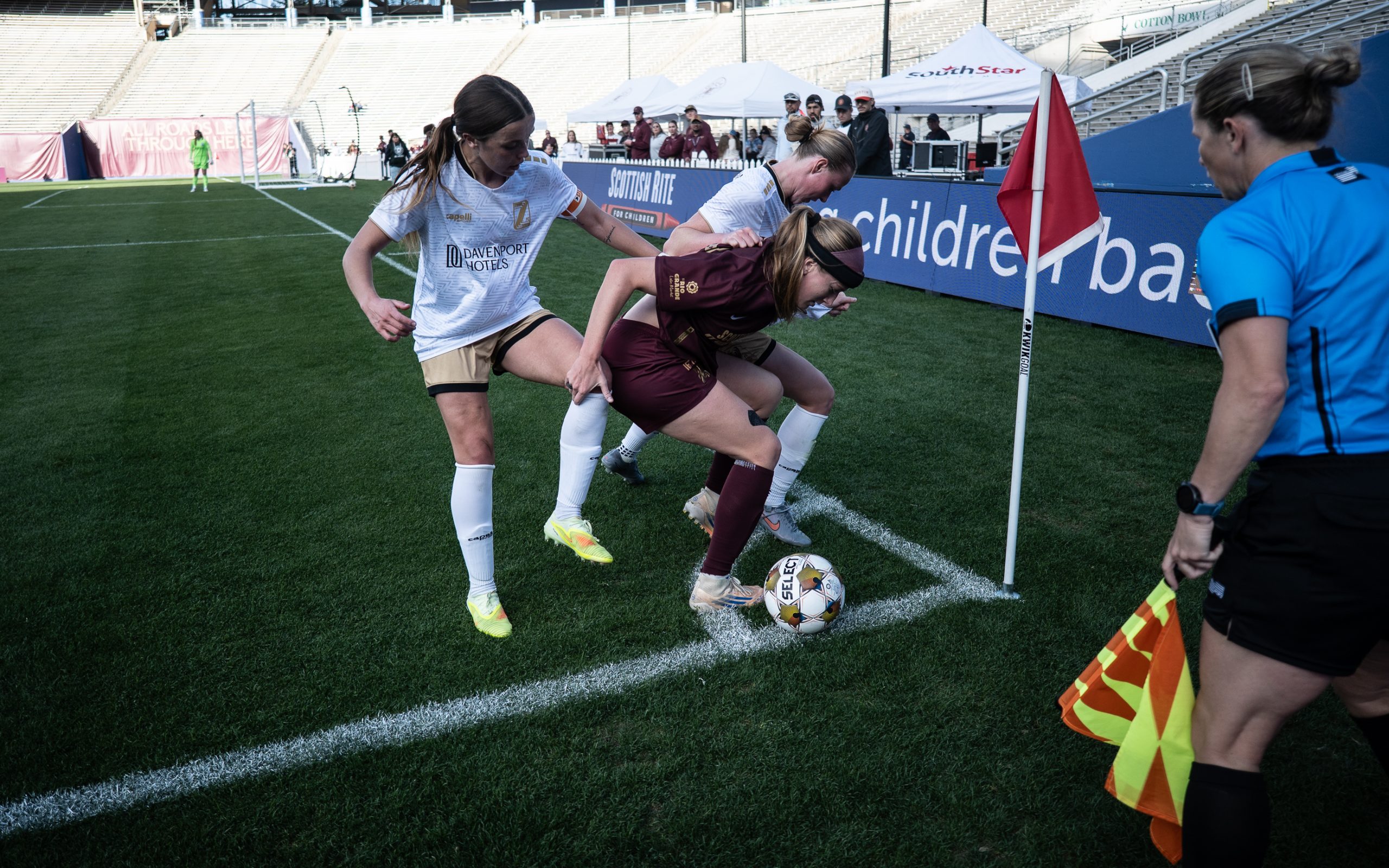 Bethany Bos holds off two defenders to kill the clock against Spokane Zephyr, April 4, 2025. (Mike Brooks, 3rd Degree)