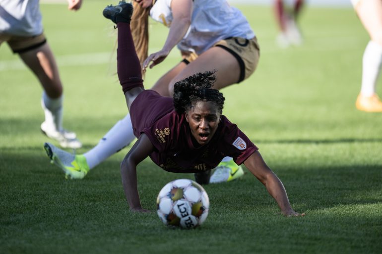 Samar Guidry doves headfirst into the action against Spokane Zephyr, April 4, 2025. (Mike Brooks, 3rd Degree)