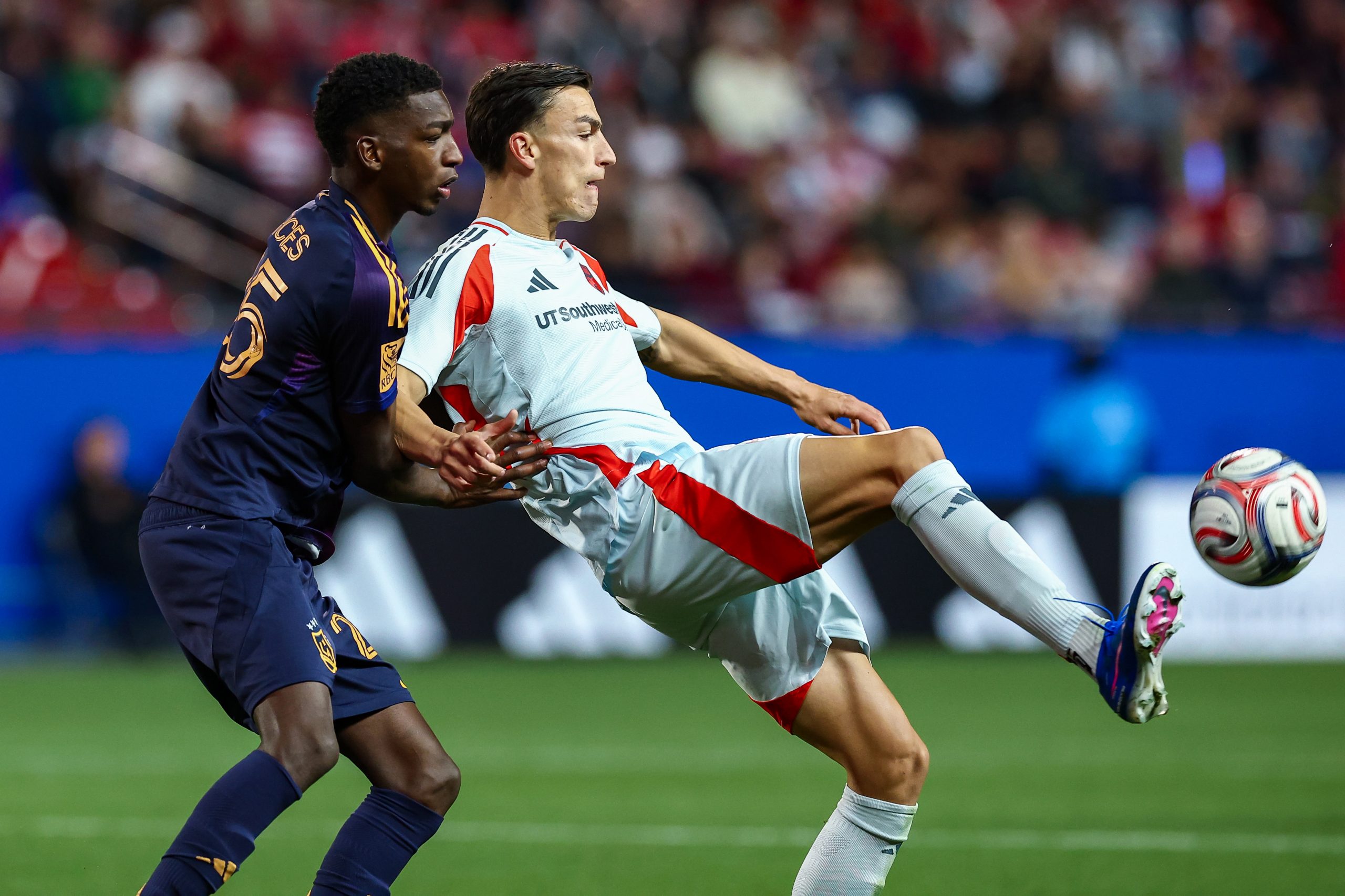 Petar Musa shields off a defender against LA Galaxy, April 18, 2026. (Matt Visinsky, 3rd Degree)