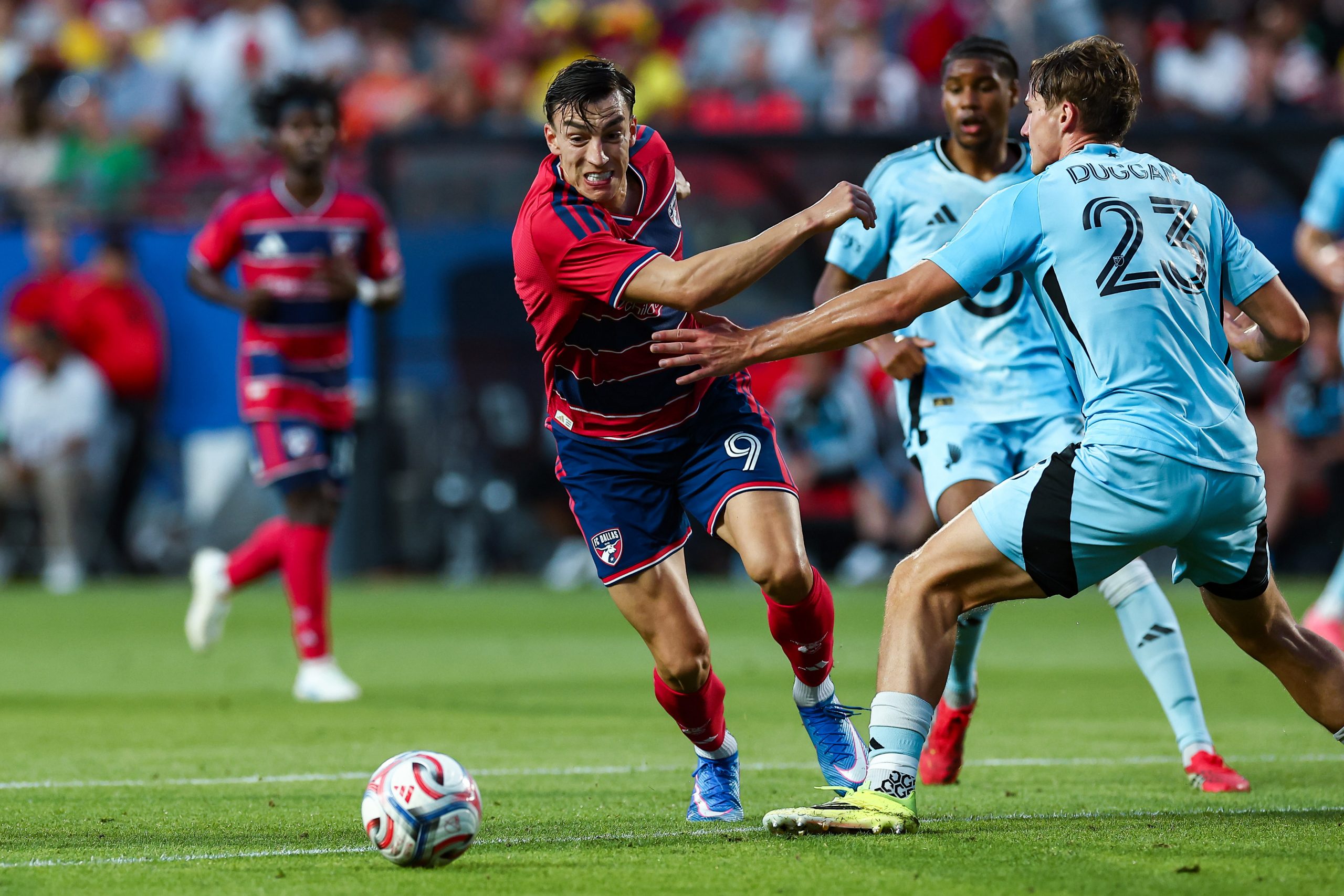 Petar Musa shoves past a defender Minnesota United, April 22, 2026. (Matt Visinsky, 3rd Degree)