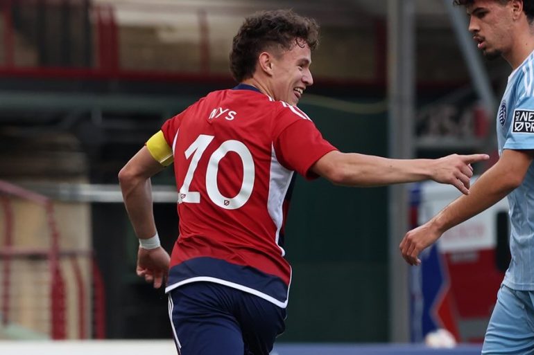 Edu Nys celebrates against Sporting KC II.