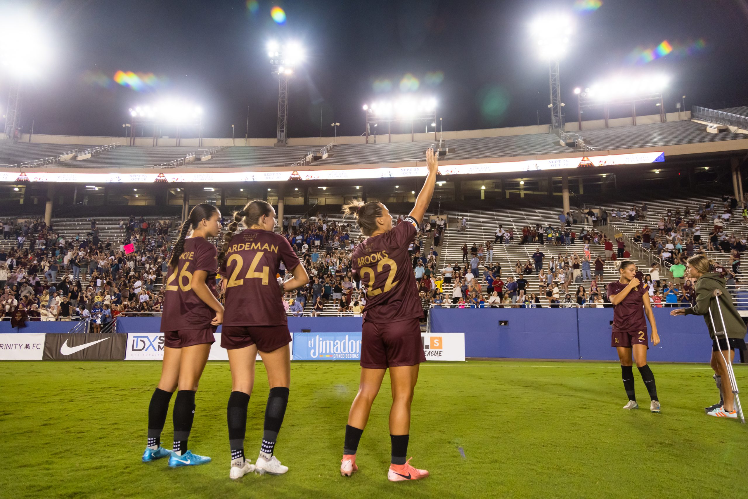 Amber Wisner salutes the fans at Cotton Bowl Stadium (Courtesy Dallas Trinity FC)