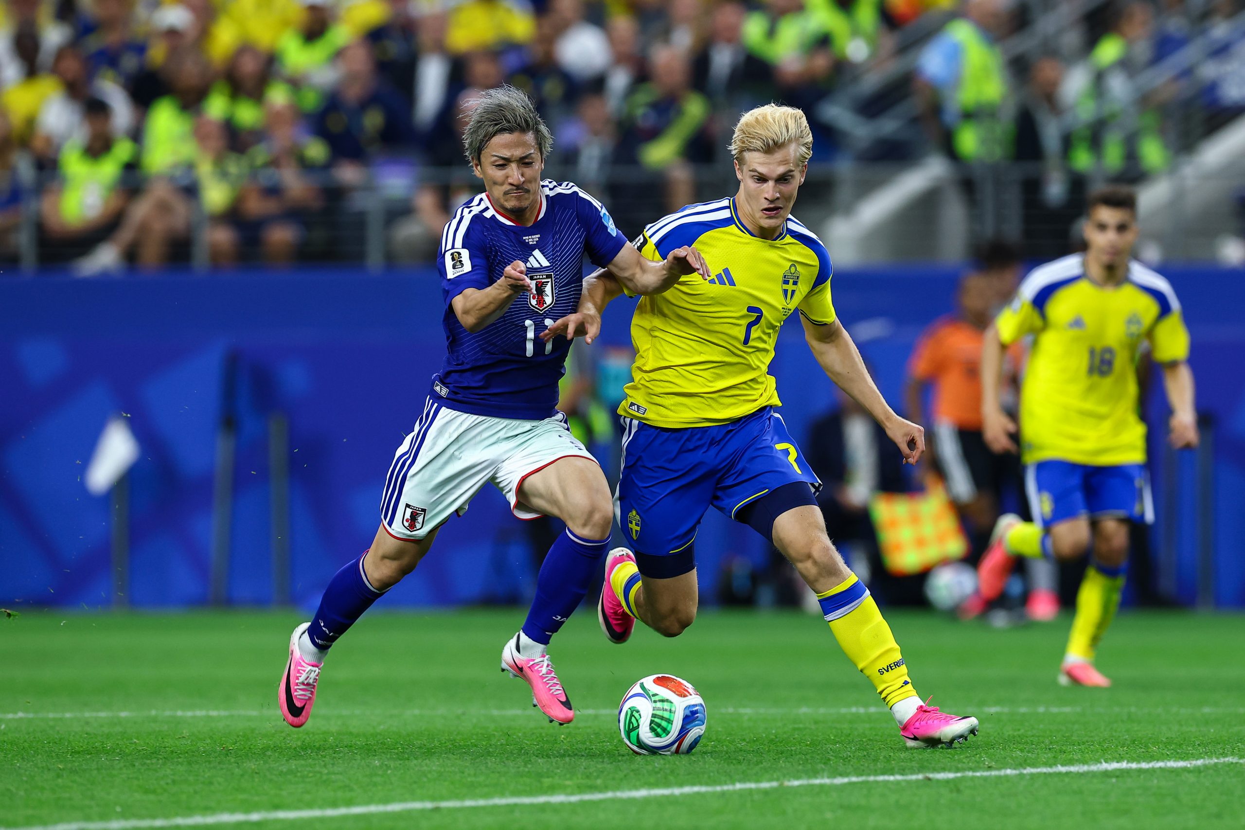 Daizen Maeda (11) battles Lucas Bergvall (7). Japan vs Sweden, 2026 World Cup at Dallas Stadium, June 25, 2026. (Matt Visinsky, 3rd Degree)