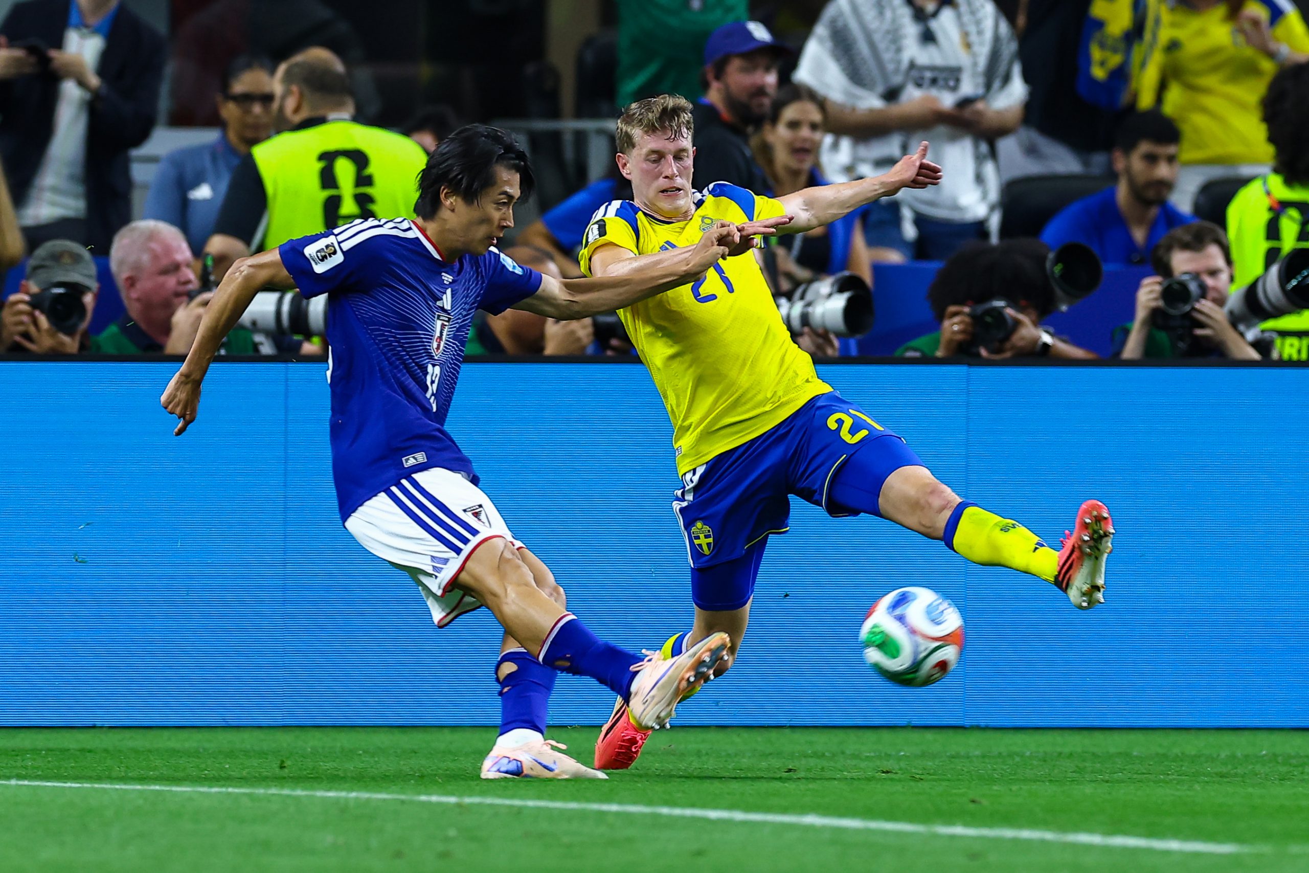 Alexander Bernhardsson (21) tries to block the shot of Keito Nakamura (13). Japan vs Sweden, 2026 World Cup at Dallas Stadium, June 25, 2026. (Matt Visinsky, 3rd Degree)