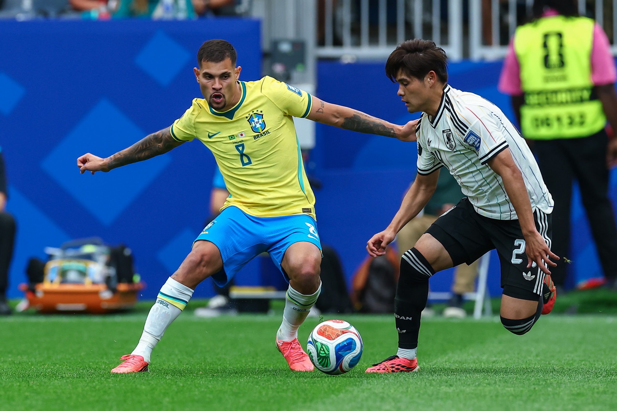 Bruno Guimarães (8) and Kaishū Sano (24) battle for the ball. Japan vs Brazil, 2026 World Cup, Dallas Stadium, June 27, 2026. (Matt Visinsky, 3rd Degree)