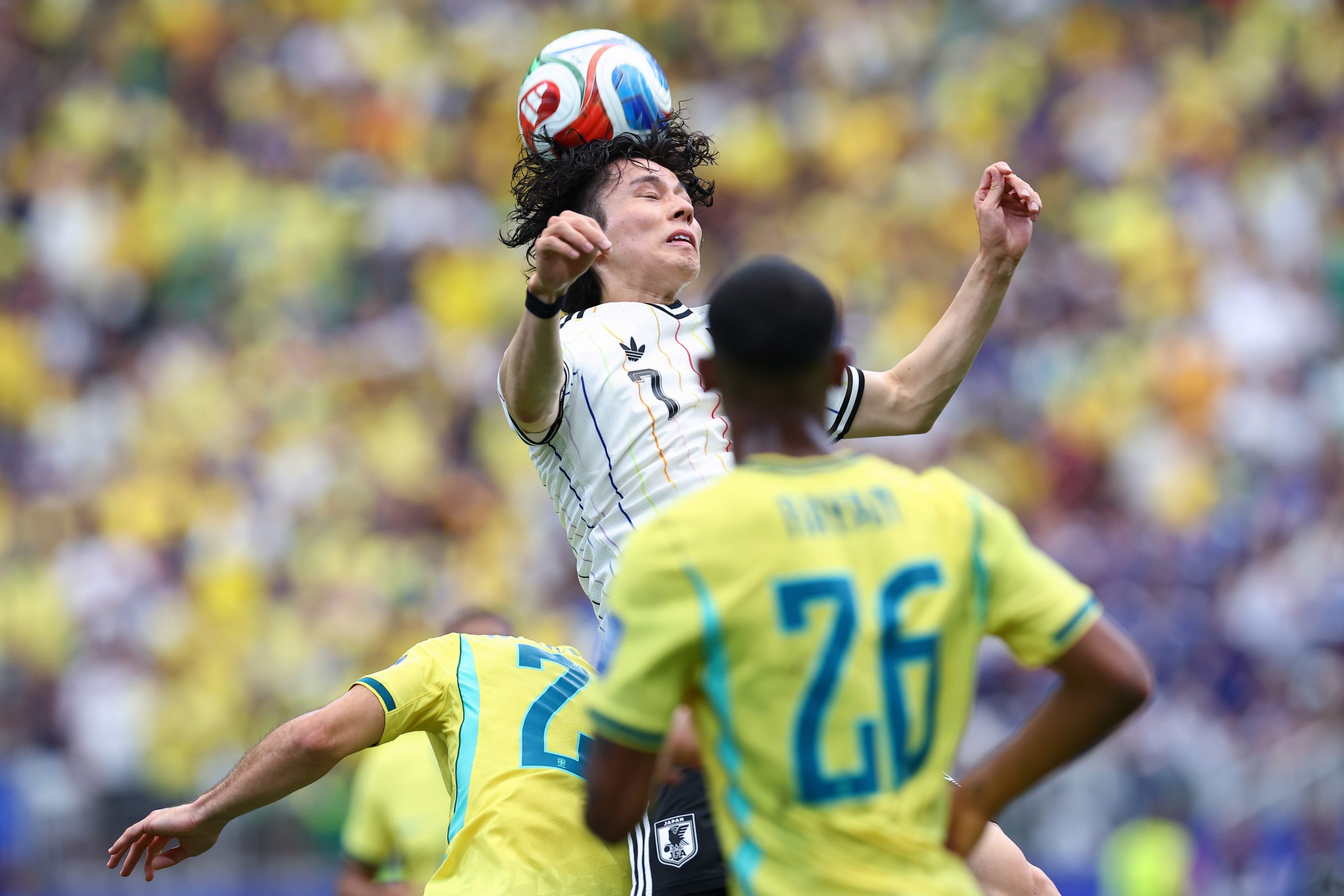 Ao Tanaka (7) wins the ball and gets undercut. Japan vs Brazil, 2026 World Cup, Dallas Stadium, June 27, 2026. (Matt Visinsky, 3rd Degree)