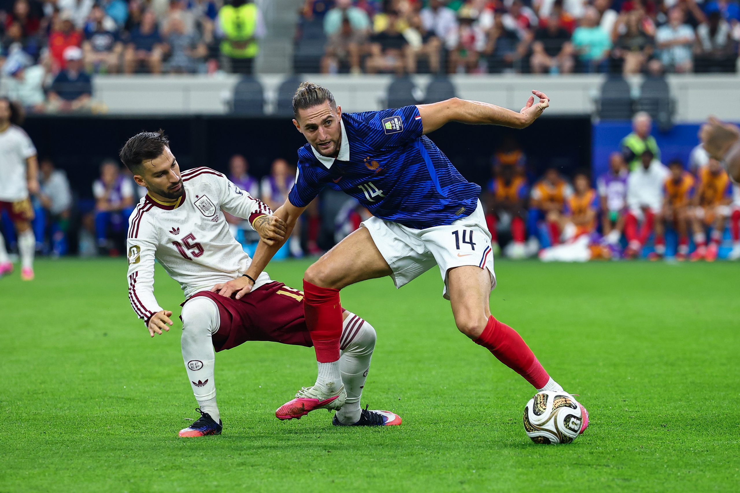 Adrien Rabiot (14) holds off Álex Baena (15). France vs Spain, 2026 World Cup, Dallas Stadium, July 14, 2026. (Matt Visinsky, 3rd Degree)