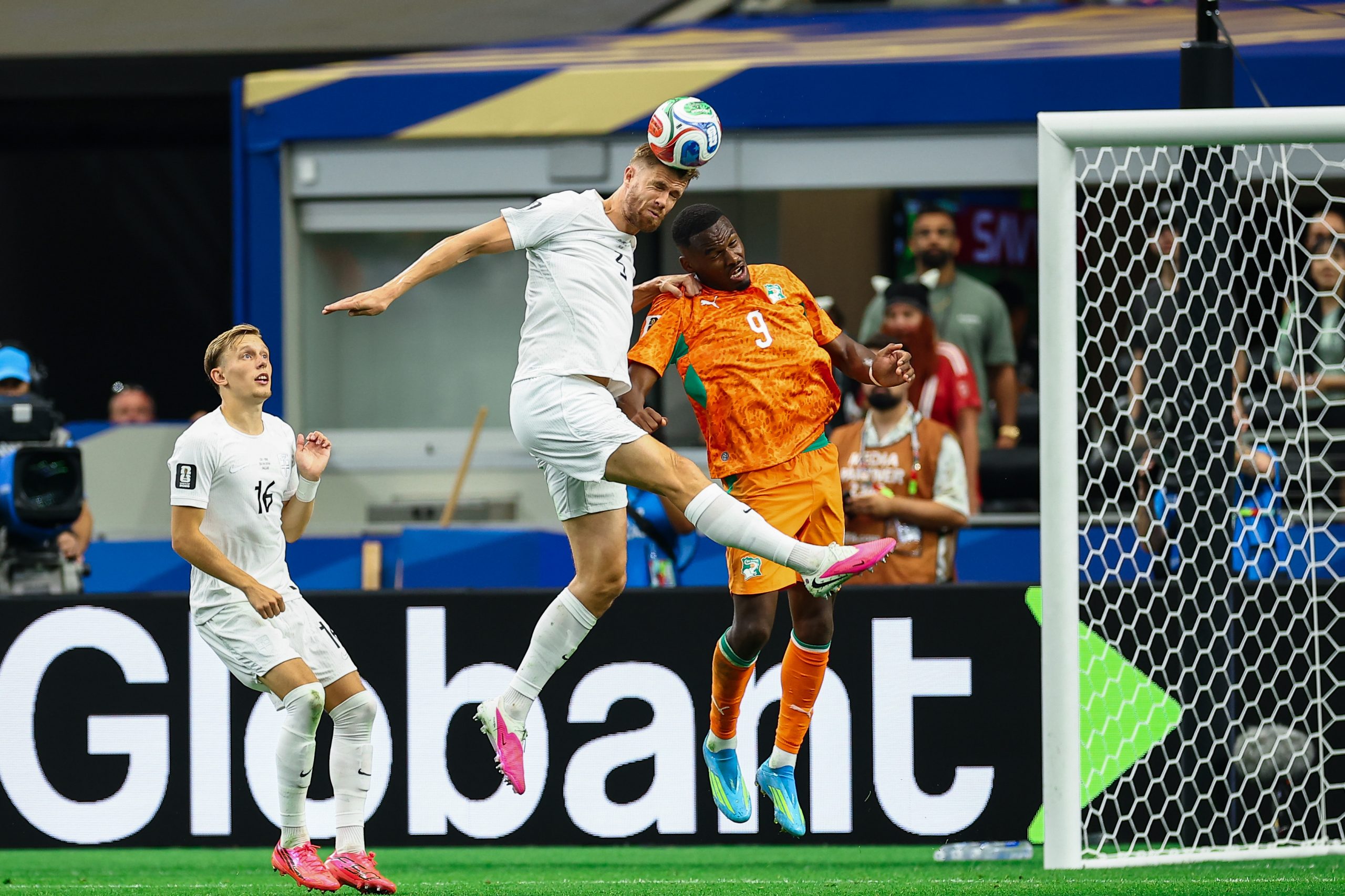 Kristoffer Ajer (3) wins the header over Ange-Yoan Bonny(9), Norway vs Côte d'Ivoire, 2026 World Cup, Dallas Stadium, June 27, 2026. (Matt Visinsky, 3rd Degree)