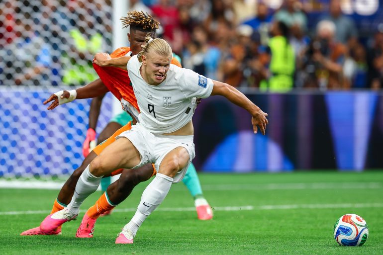 Erling Haaland (9) fights off his marker. Norway vs Côte d'Ivoire, 2026 World Cup, Dallas Stadium, June 27, 2026. (Matt Visinsky, 3rd Degree)