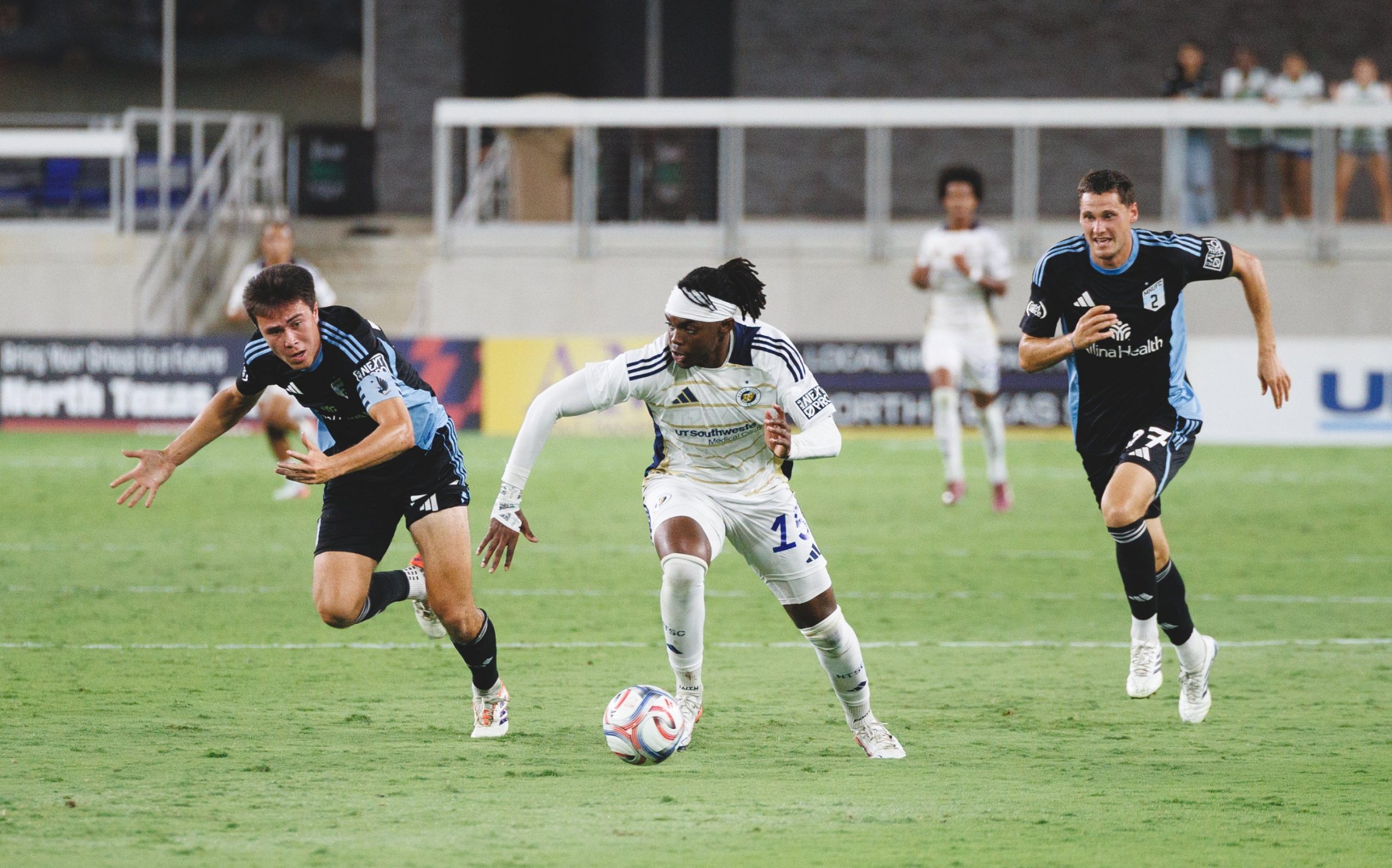 Ricky Louis (15) drives forward. North Texas SC vs Minnesota United FC 2, August 22, 2026. (Cort Letcher, 3rd Degree)