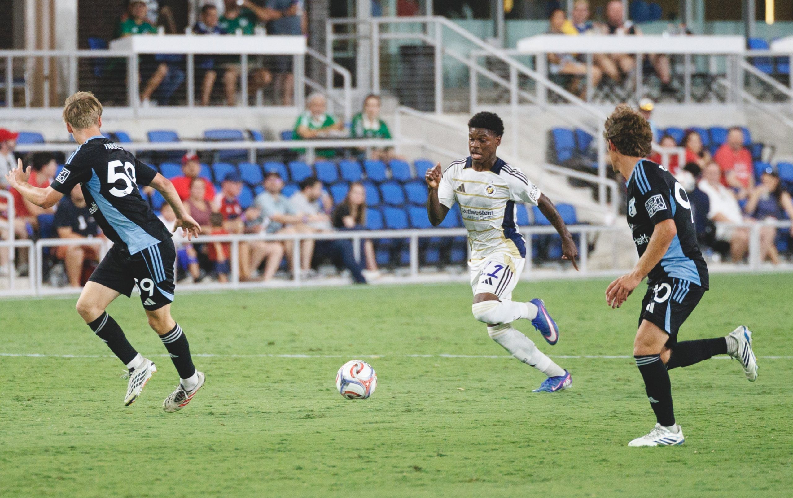 Natty James (11) tries to split two defenders. North Texas SC vs Minnesota United FC 2, August 22, 2026. (Cort Letcher, 3rd Degree)