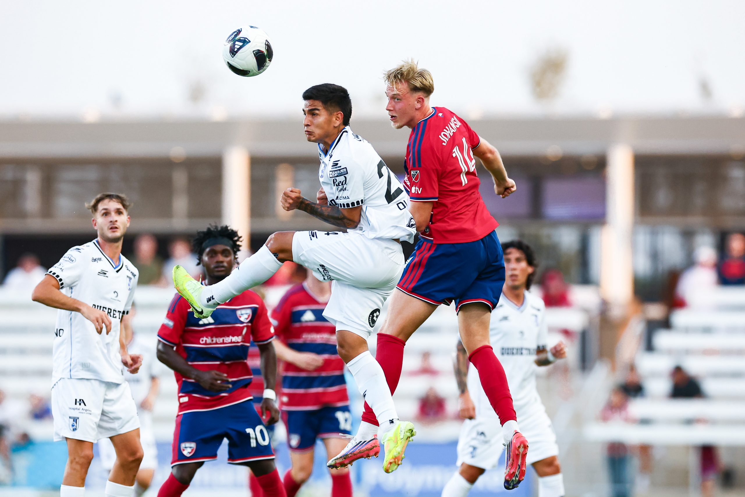 Herman Johansson (14) fights for a header against Querétaro FC in Leagues Cup Game One, August 5, 2026. (Matt Visinsky, 3rd Degree)