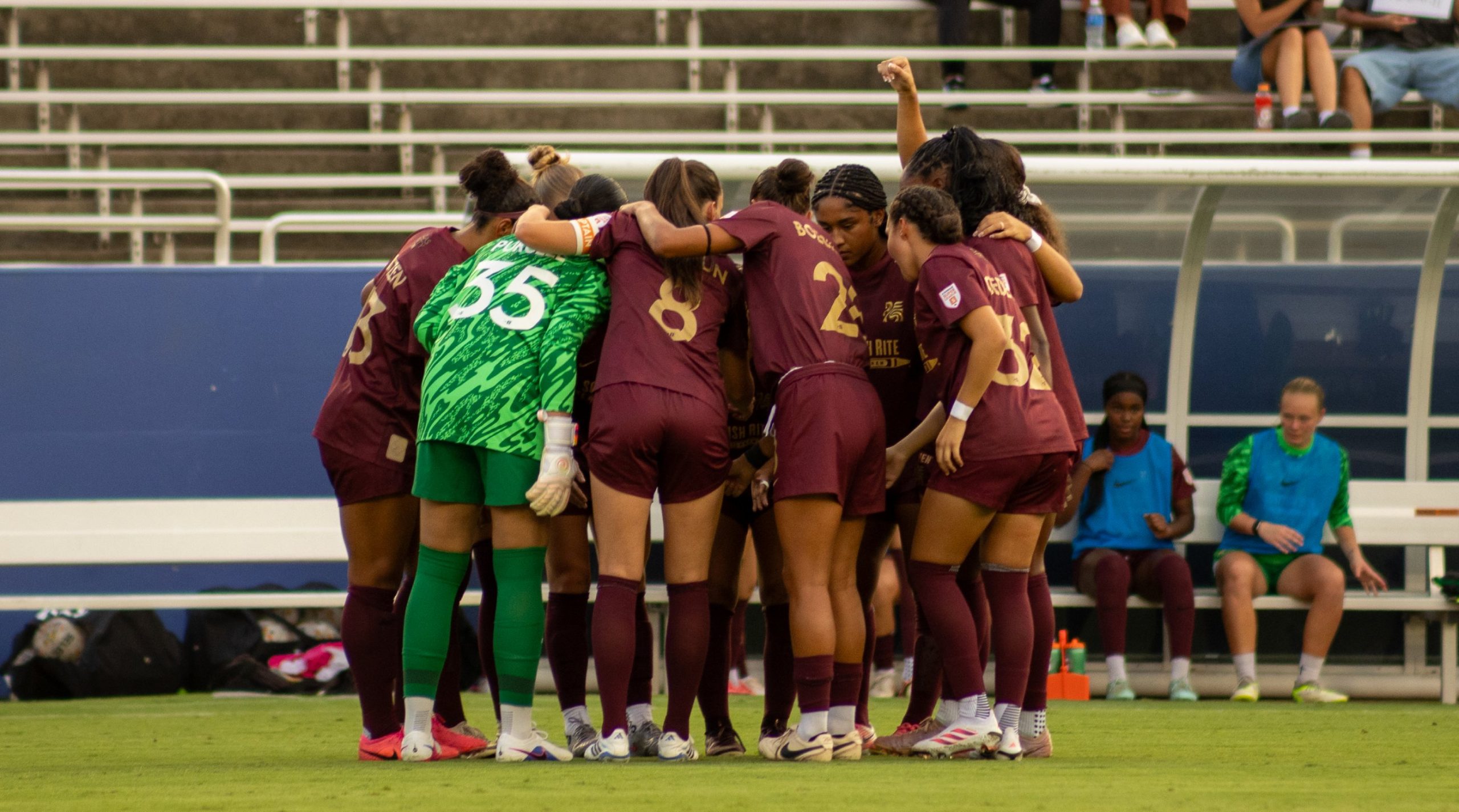 Trinity huddles up before kickoff, Dallas Trinity vs Carolina Ascent, August 22, 2026. (Beth Spicer, 3rd Degree)