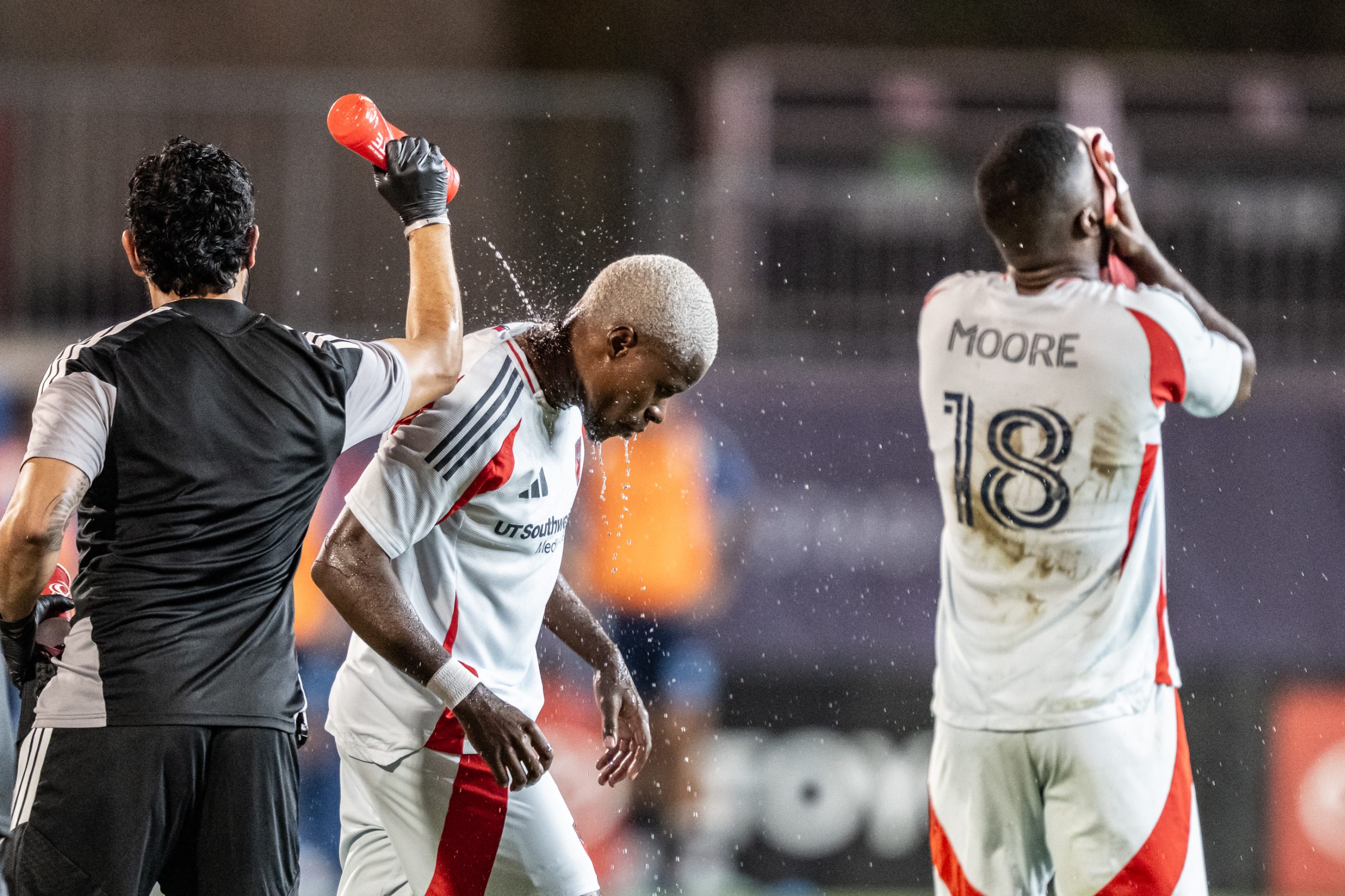 Bernie Kamungo (77) and Shaq Moore (18) try to stay cool against Sporting KC, September 5, 2026. (Mike Brooks, 3rd Degree)