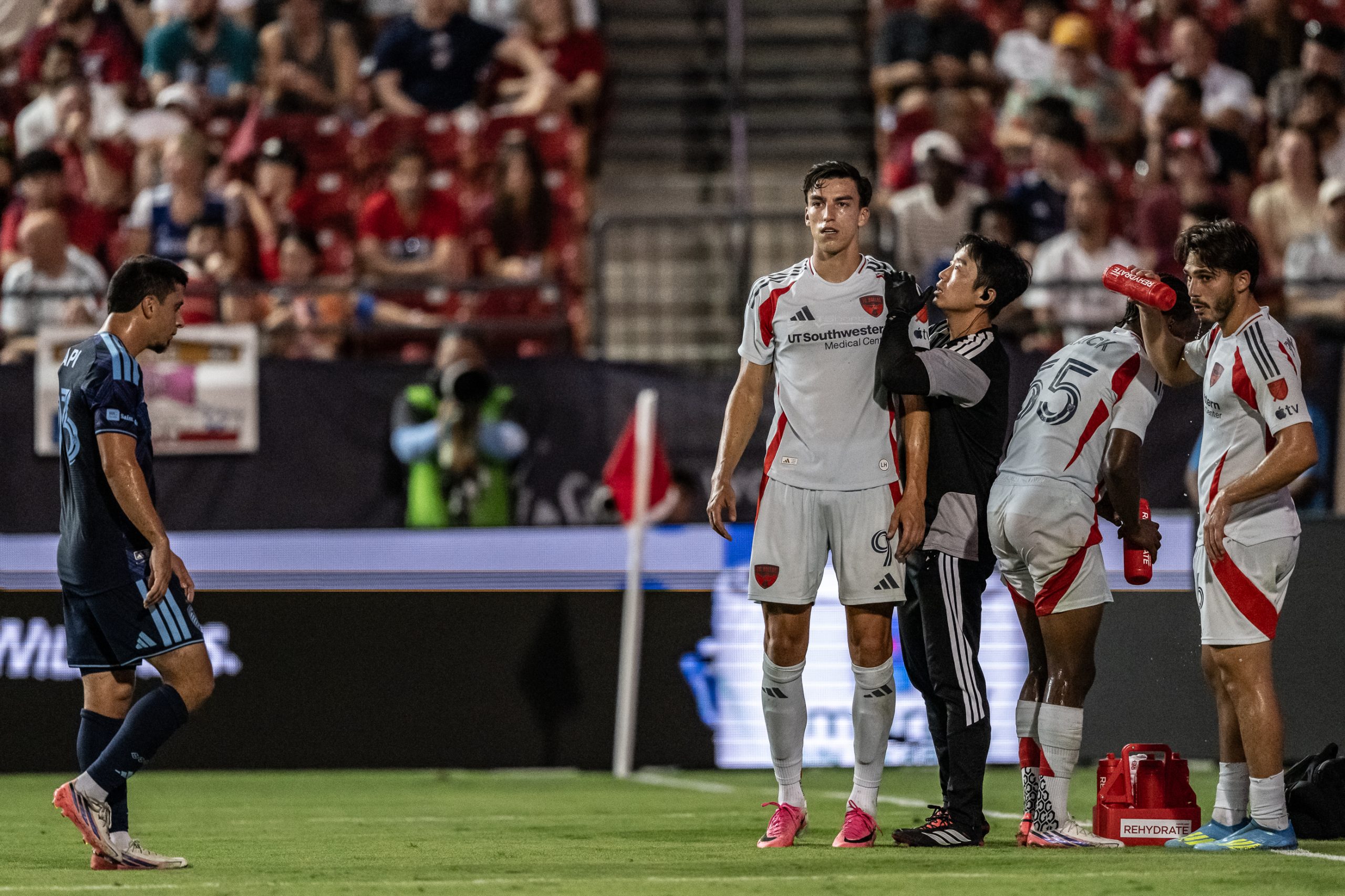 Petar Musa (9) of FC Dallas has his shoulder/collar bone checked out against Sporting KC, September 5, 2026. (Mike Brooks, 3rd Degree)
