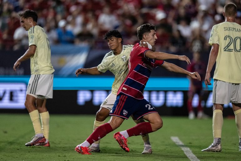 Logan Farrington (23) is tackled during the FC Dallas win over the Portland Timbers, September 12, 2026. (Mike Brooks, 3rd Degree)