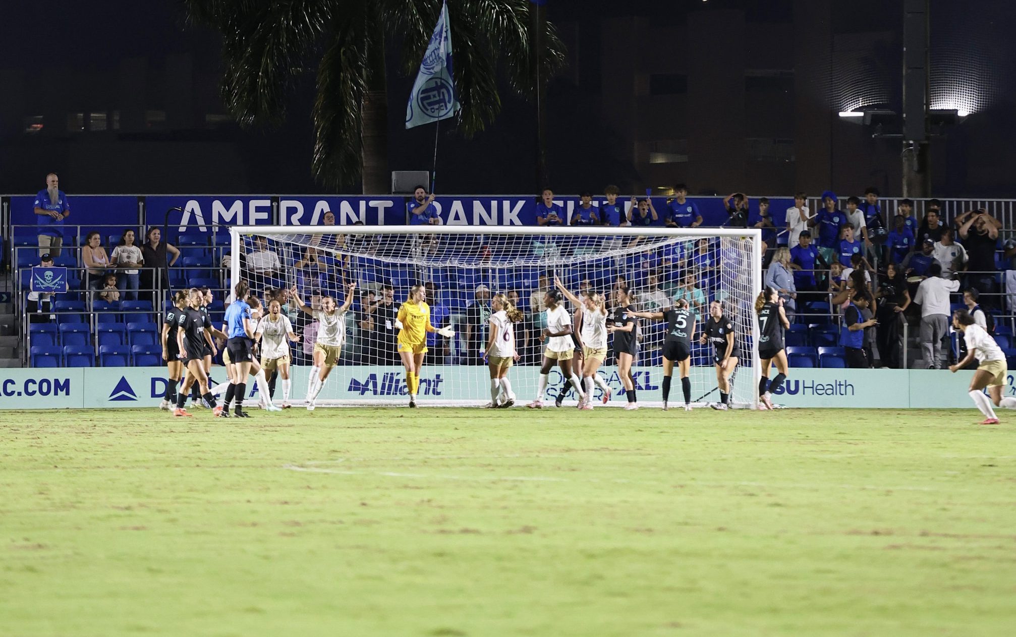 Dallas Trinity celebrate Felicia Knox's first goal of the season (at Ft Lauderdale United, Sept 18, 2026 - Photo: Kylli Asaro, Dallas Trinity FC)