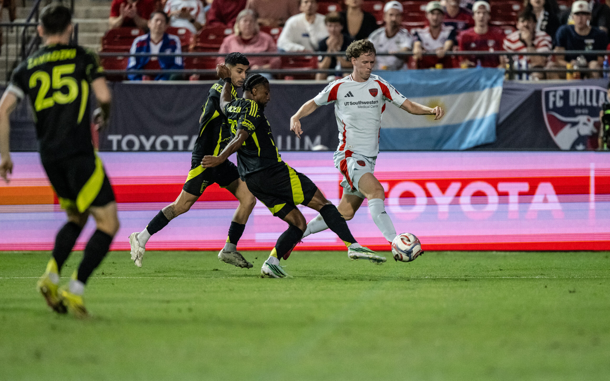 Christian Cappis (12) escapes two defenders in midfield, FC Dallas vs Columbus Crew, October 28, 2026. (Mike Brooks, 3rd Degree)