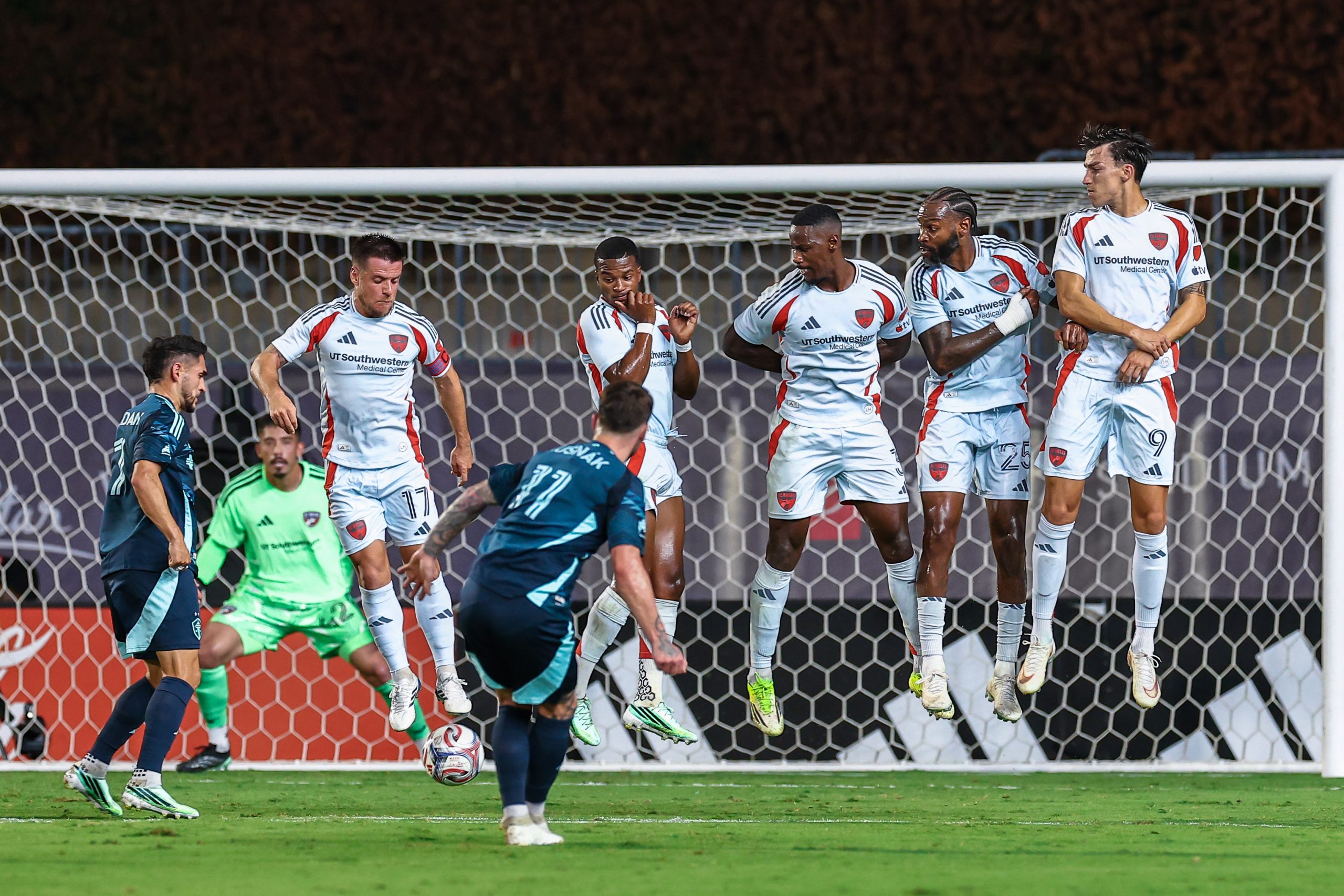 Albert Rusnák (11) tries to shoot under the jumping FC Dallas wall. FC Dallas vs Seattle Sounders, October 14, 2026. (Matt Visinsky, 3rd Degree)