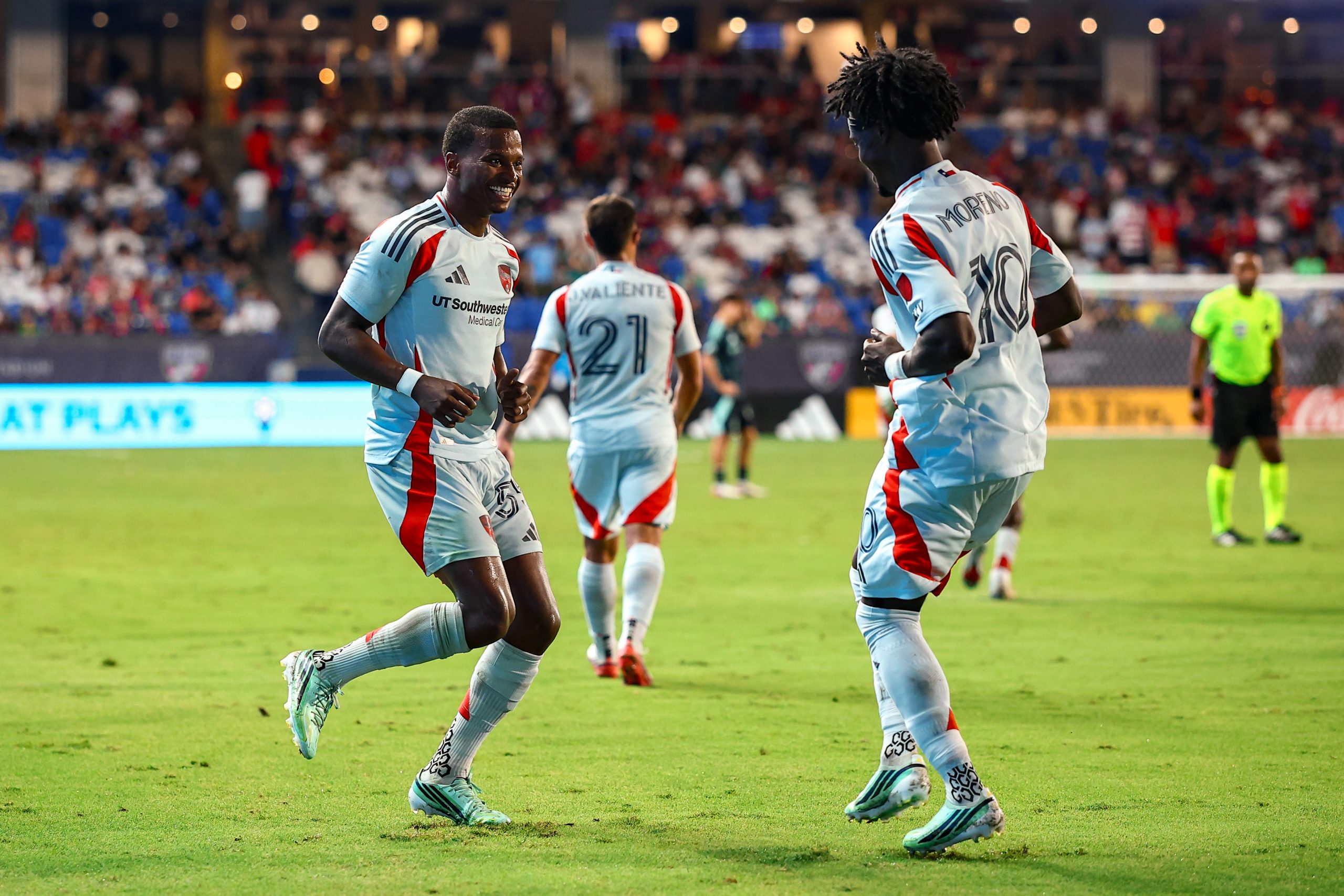 Kaick (55) and Santi Moreno (10) dance in celebration. FC Dallas vs Seattle Sounders, October 14, 2026. (Matt Visinsky, 3rd Degree)