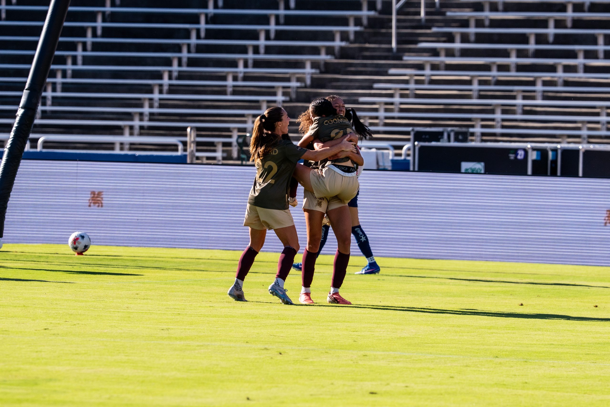 Drew Coomans celebrates her assist with her teammates (Photo: Anna Dolmany Courtesy: Dallas Trinity FC)