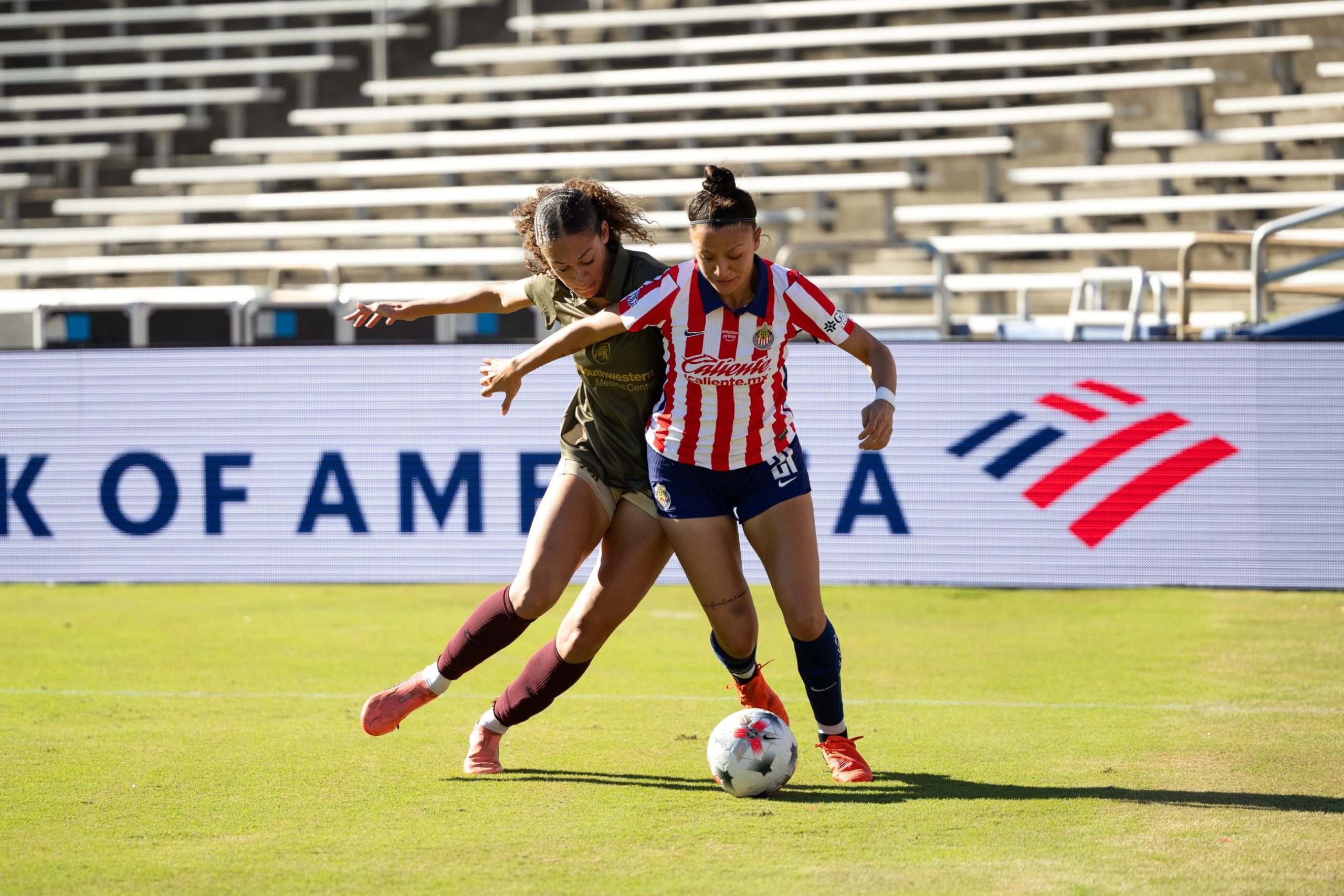 Kalea Eichenberger (9) high presses a Chivas defender. Dallas Trinity vs Chivas Femenil, 2026 State Fair Clásico, October 17. 2026. (Beth Spicer, 3rd Degree)