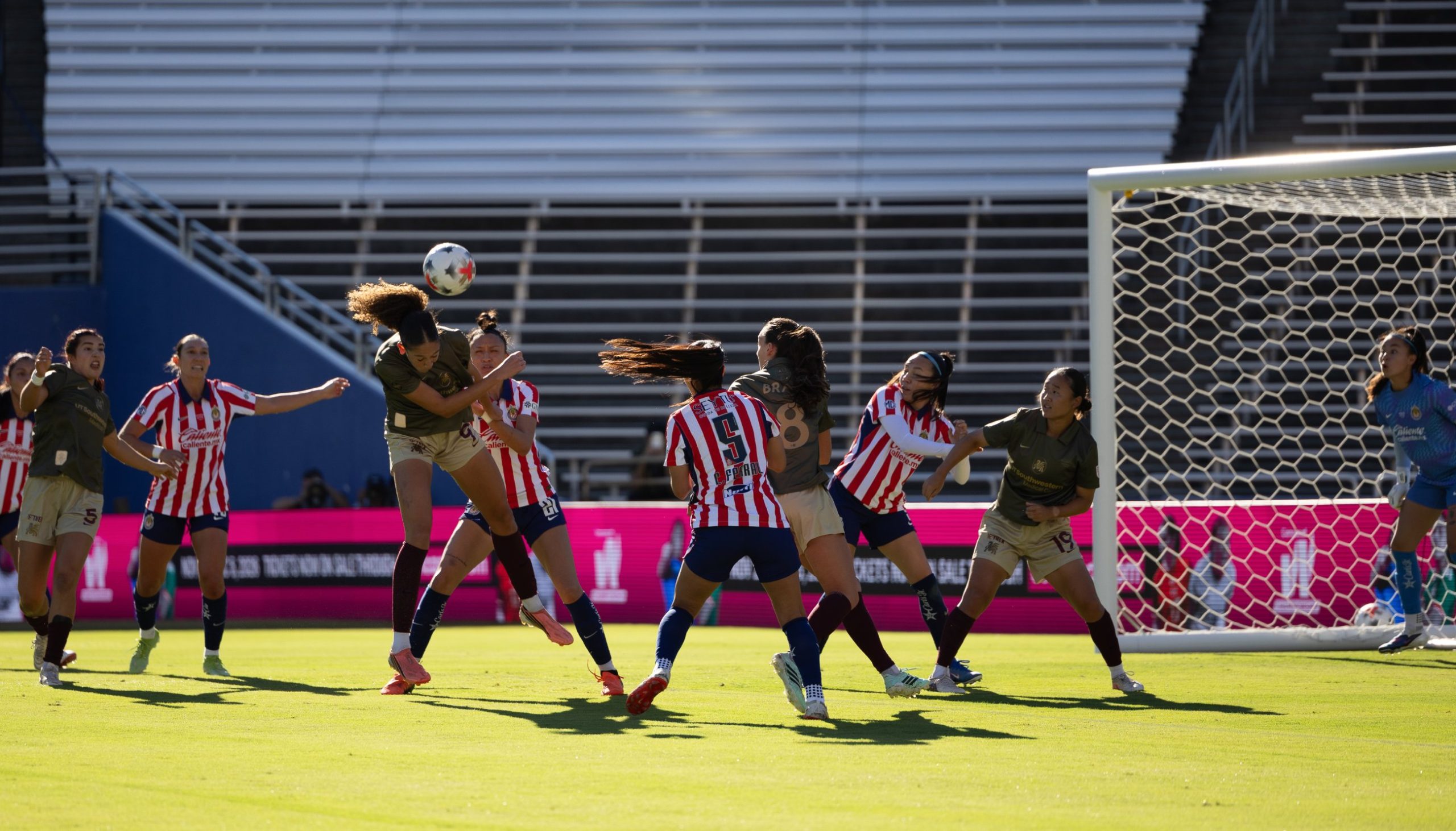 Kalea Eichenberger (9) gets a head to a corner. Dallas Trinity vs Chivas Femenil, 2026 State Fair Clásico, October 17. 2026. (Beth Spicer, 3rd Degree)